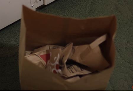 Take the brown paper bag and stuff it with some newspapers or more paper bags.