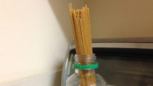 Spaghetti Portions with a Soda Bottle